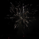 Exploding glitter fireworks in yellow